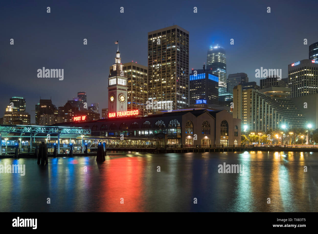 The Ferry Building and City Skyline at night, San Francisco, California, USA Stock Photo