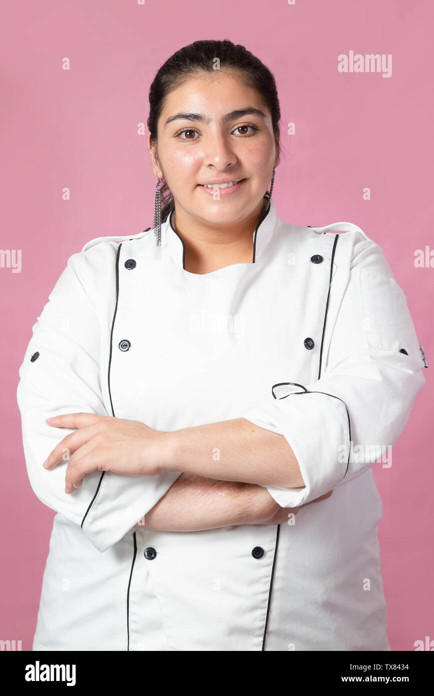 Empowered Chef With Arms Crossed Smiling At Camera Latina Woman Stock Photo Alamy