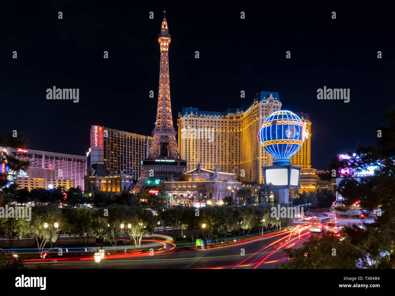 The Paris Las Vegas Hotel and Las Vegas Eiffel Tower at night, Las Vegas, Nevada, USA Stock Photo