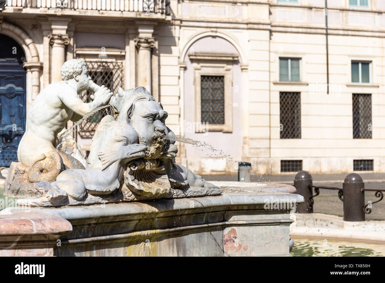 Detail sculpture of a triton, greek God. The Moor Fountain (Italian: Fontana del Moro) in Navona Square, Rome, Italy. Stock Photo