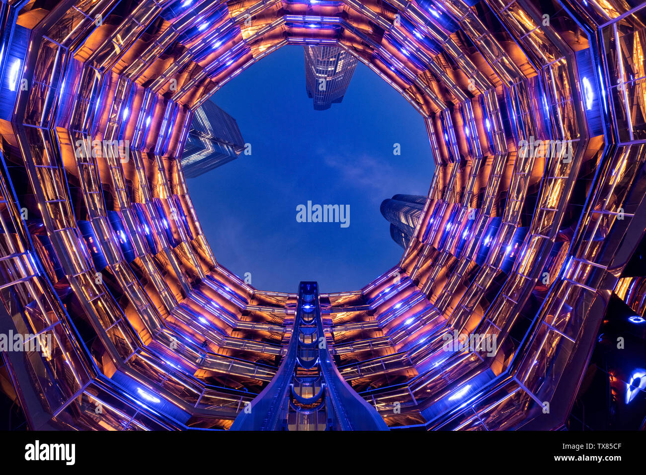 Looking up from the centre of The Vessel at night, Hudson Yards, New York, USA Stock Photo