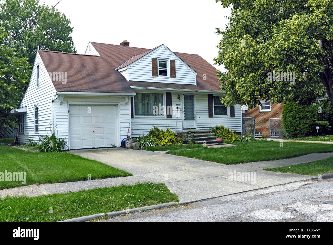 Diane Madison, mother of convicted serial killer Michael Madison, was slain in this Cleveland Ohio home on June 22, 2019.  The mother and three children, two 10-year olds and a 12-year old, were stabbed by an intruder with two of the children eventually escaping to get help.  The three children sustained injuries but were not slain. The suspected killer, Jaylen Latrell Plummer, was found in the shower in the house and is in custoday.  The home is also where Michael Madison barricaded himself inside in 2013 prior to his arrest for the serial murders. Stock Photo