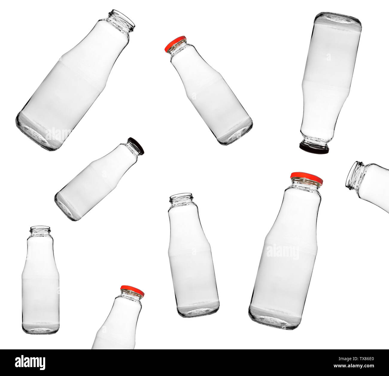 Empty glass bottle for drinks milk, juice, water pattern on a white background. Stock Photo