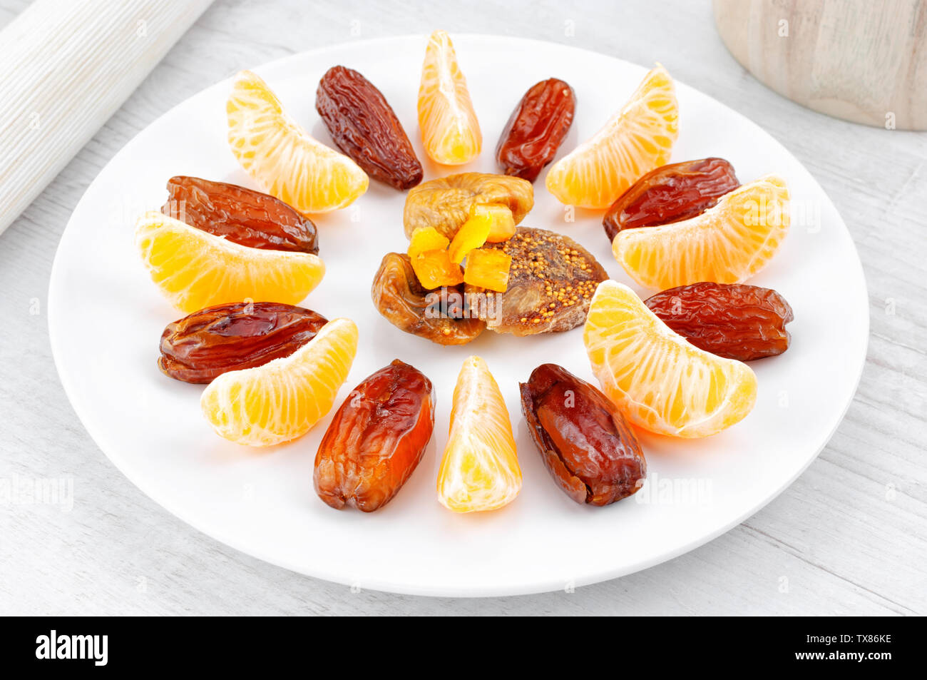 Dried dates fruit on wooden table Stock Photo