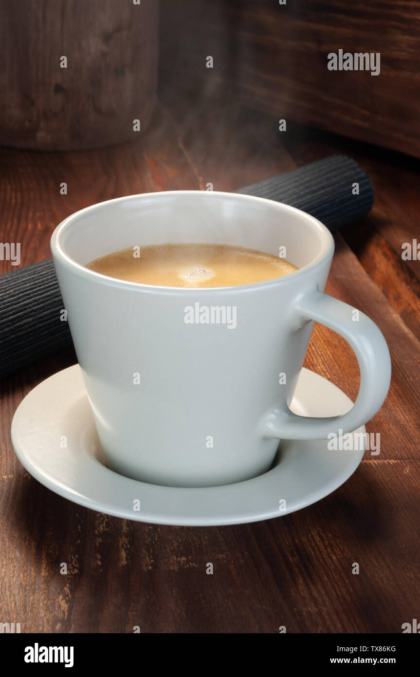 Cup of coffee on wooden table Stock Photo
