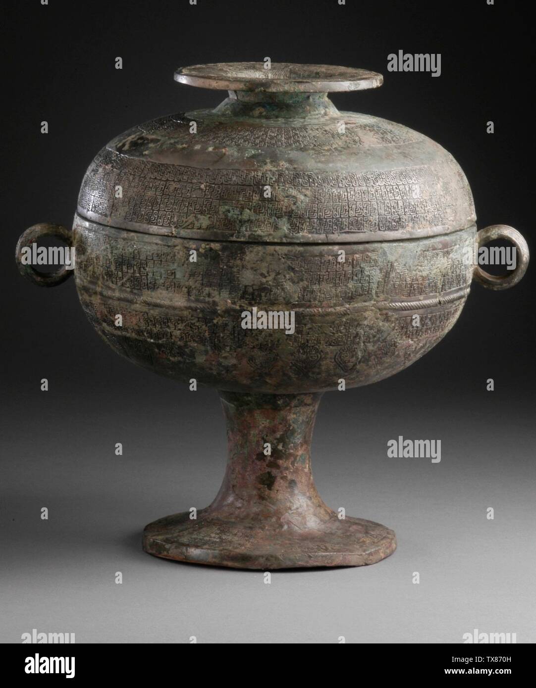Lidded Tureen (Dou) with Interlaced Dragons;  China, Early Eastern Zhou dynasty, Spring and Autumn period, 771-481 B.C. Furnishings; Serviceware Cast bronze Gift of Mr. and Mrs. Eric Lidow (AC1998.251.19a-b) Chinese Art; 771-481 B.C.; Stock Photo