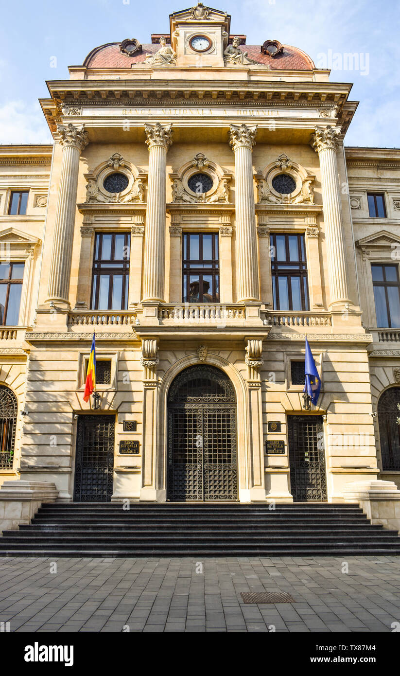 Neo-classical architecture of the newly renovated romanian national bank in the Downtown of Bucharest on Lipscani Street. The National Bank of Romania Stock Photo
