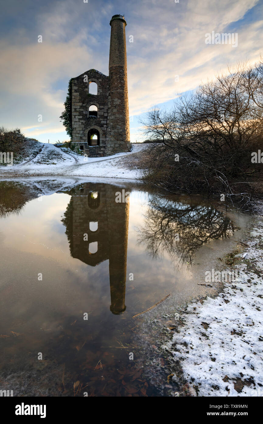 Snow ar Cake and Ale Engine House on United Downs in Cornwall. Stock Photo