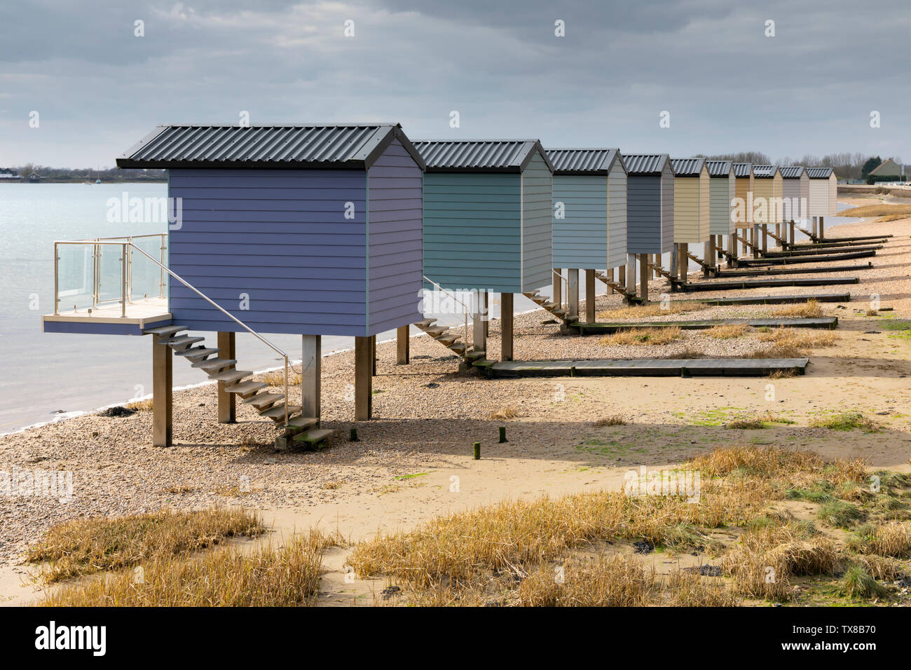 Osea Beach Huts on the Blackwater Estuary in Essex. Stock Photo