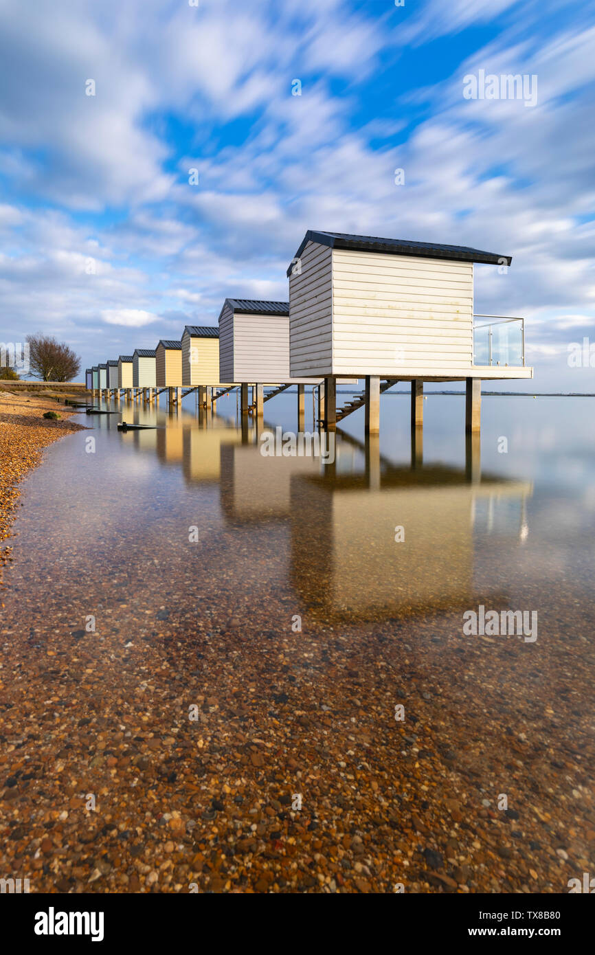 Osea Beach Huts on the Blackwater Estuary in Essex. Stock Photo