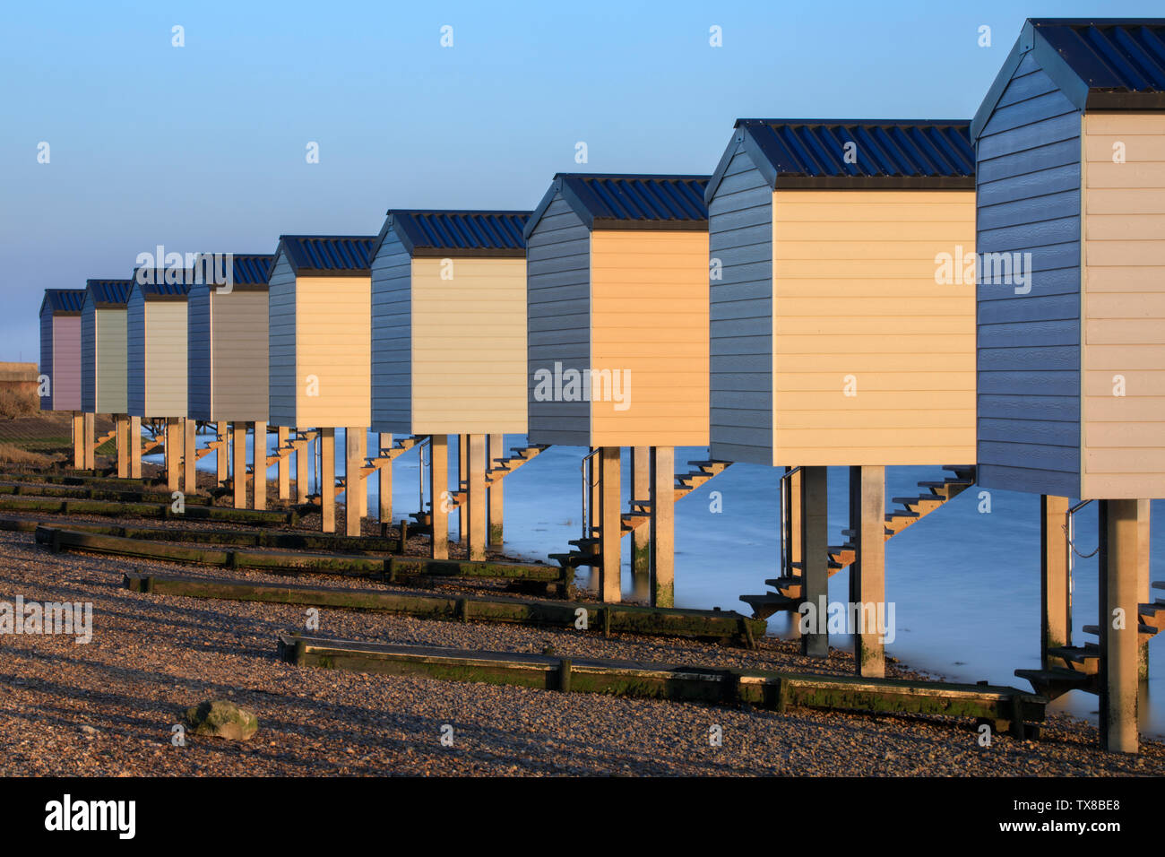 Osea Beach Huts on the Blackwater Estuary in Essex. Stock Photo
