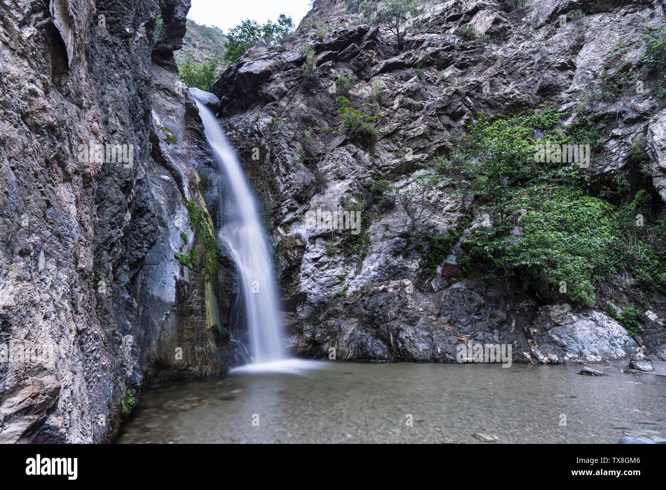 Waterfall at popular Eaton Canyon in the San Gabriel Mountains near Los Angeles and Pasadena in Southern California. Stock Photo