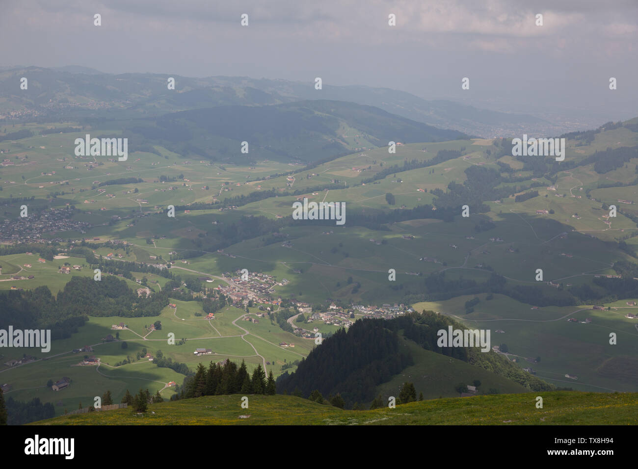 Looking out across the beautiful Appenzell Alps from Ebenalp, Switzerland on a cloudy Alpine day. Stock Photo