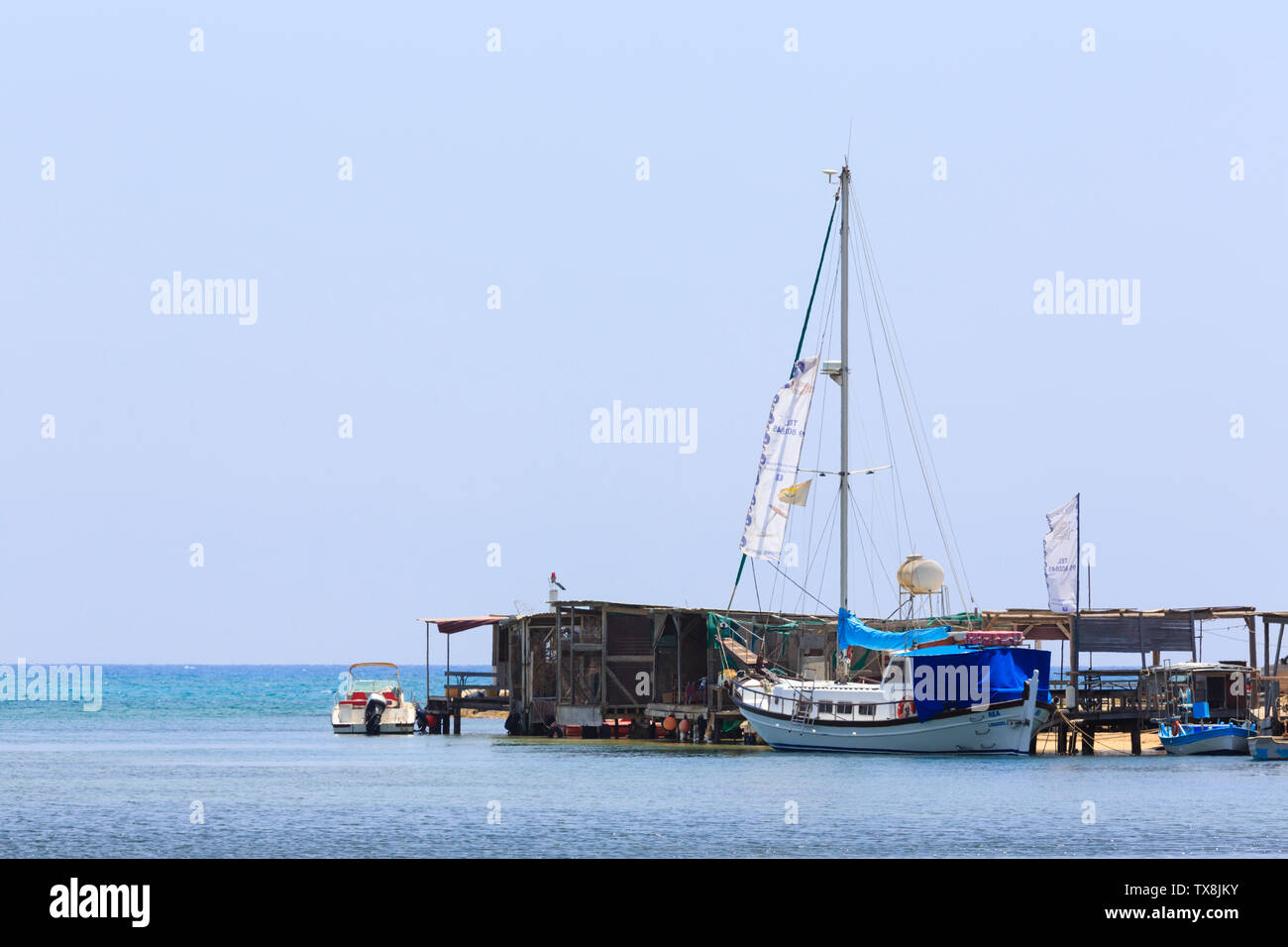 Boats moored at the inlet to Potamos Creek, Liopetri, Cyprus. Stock Photo