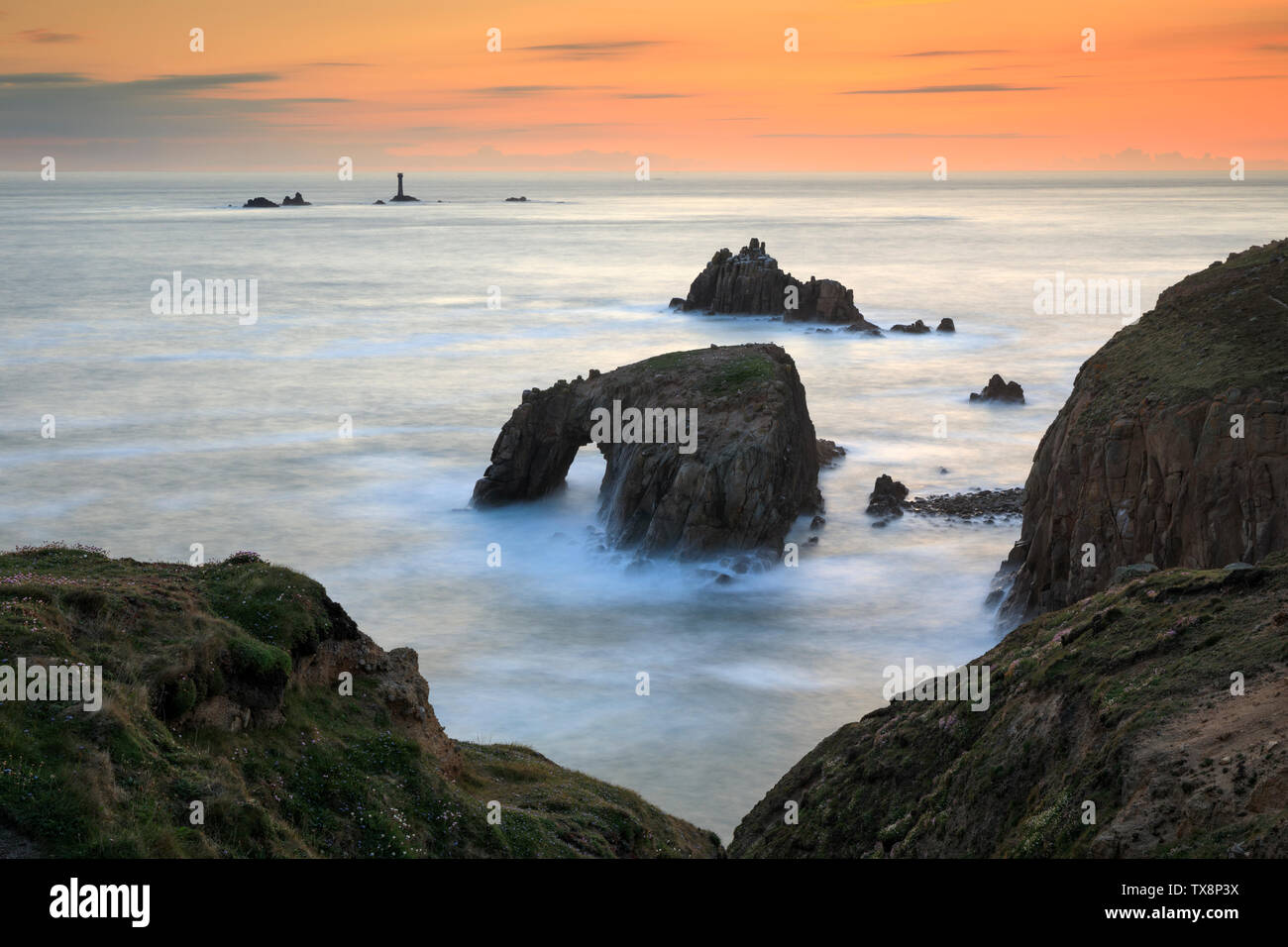 Sunset captured from Enys Point at Land's End Stock Photo