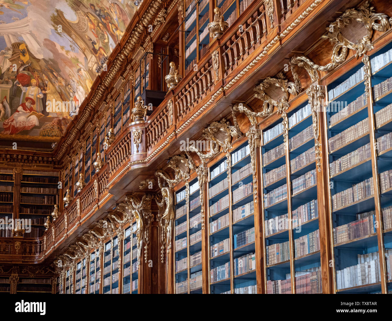 Prague, Czech Republic - June 8 2019: Bookshelf in Strahov Monastery Library, the Philosophical Hall. A Famous Baroque Library in Bohemia. Stock Photo