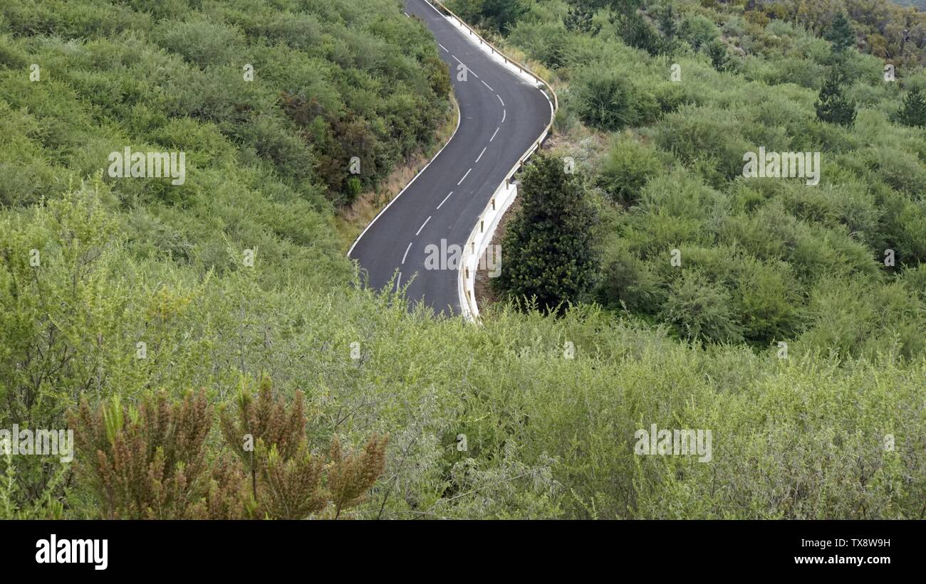 curvy serpentine roads on teide volcano on tenerife island Stock Photo
