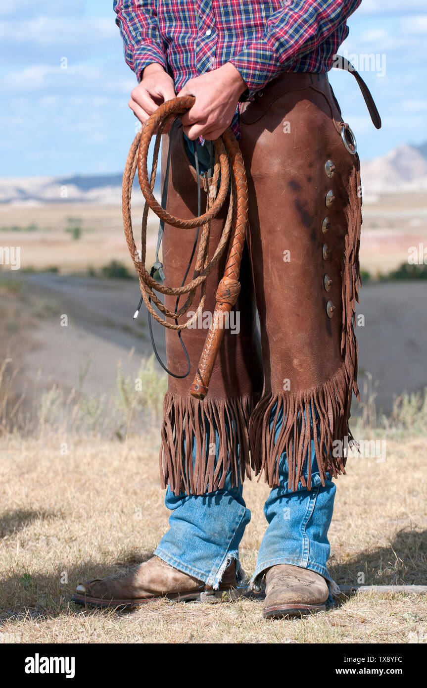 Cowboy with chap and whip, South Dakota, USA Stock Photo