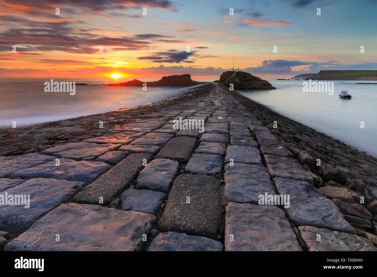 Sunset over Bude Breakwater Stock Photo