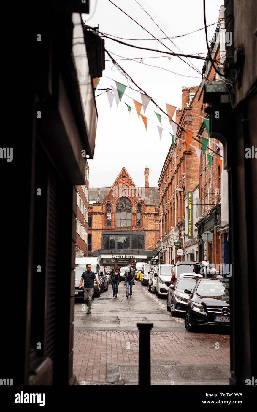 Looking down Dame Street toward the Dunnes Stores grocery on South Great George's Street in Dublin, Ireland. Stock Photo