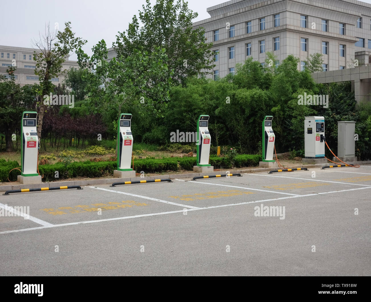 Electric vehicle charging piles and special Stock Photo - Alamy
