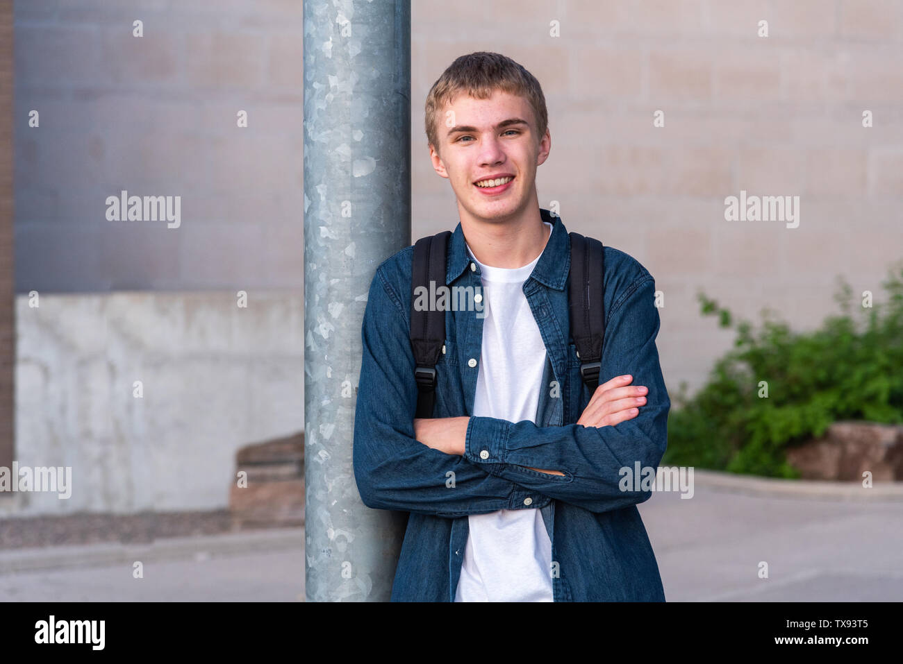 Man in front of high school hi-res stock photography and images - Alamy