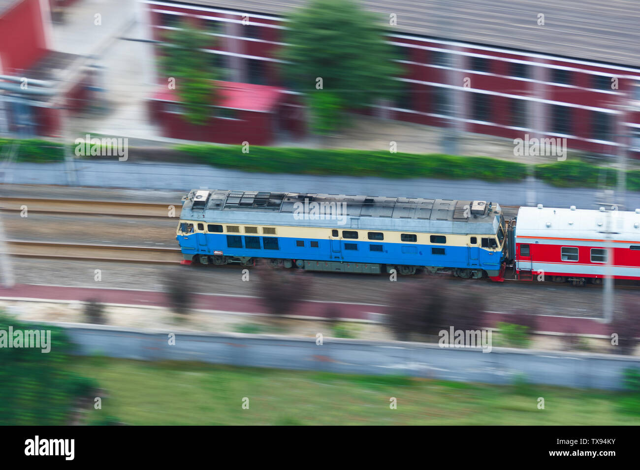 A high-speed internal combustion engine train on a railway. Stock Photo