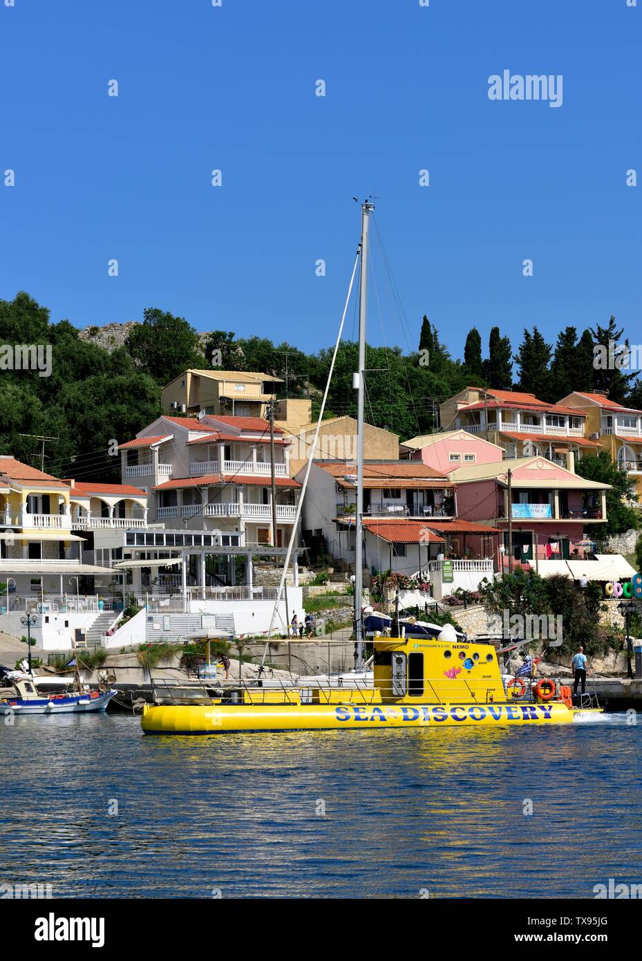 Sea Discovery,Yellow Submarine,Tourists Glass bottom boat,Kassiopi bay,Kassopaia,Ionian Islands, Corfu ,Greece Stock Photo