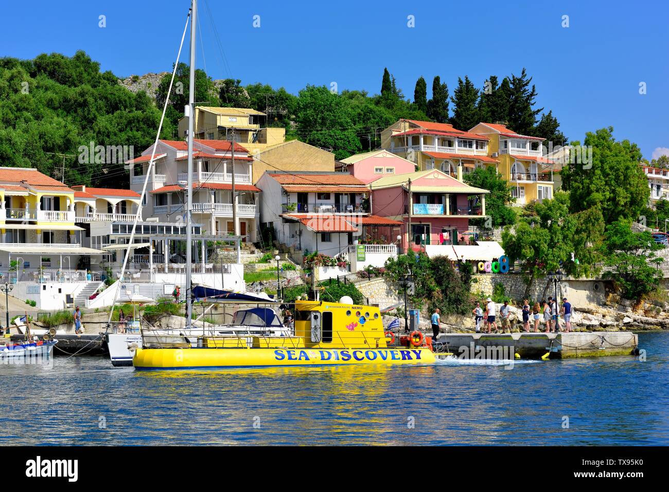 Sea Discovery,Yellow Submarine,Tourists Glass bottom boat,Kassiopi bay,Kassopaia,Ionian Islands, Corfu ,Greece Stock Photo