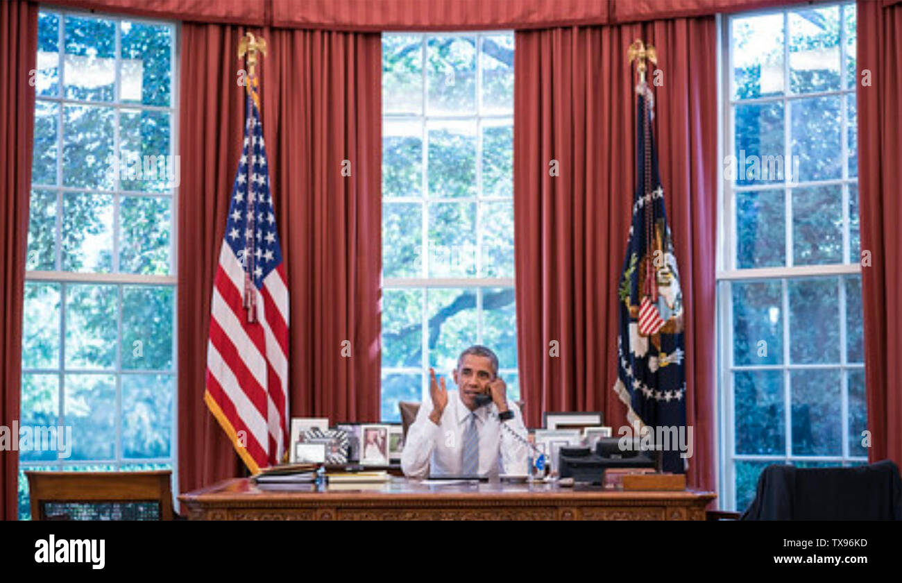BARACK OBAMA as 44th President of the United States in the Oval Office about 2012 . Photo: White House. Stock Photo