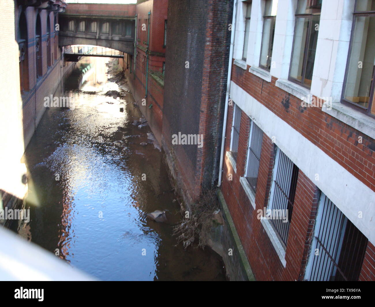 River Medk running under Oxford Road/Oxford Street, Manchester. S Knights, my photo, 10 Feb 2008; 11 February 2008 (original upload date); Own workTransferred from en.pedia; SuzanneKn at en.pedia; Stock Photo