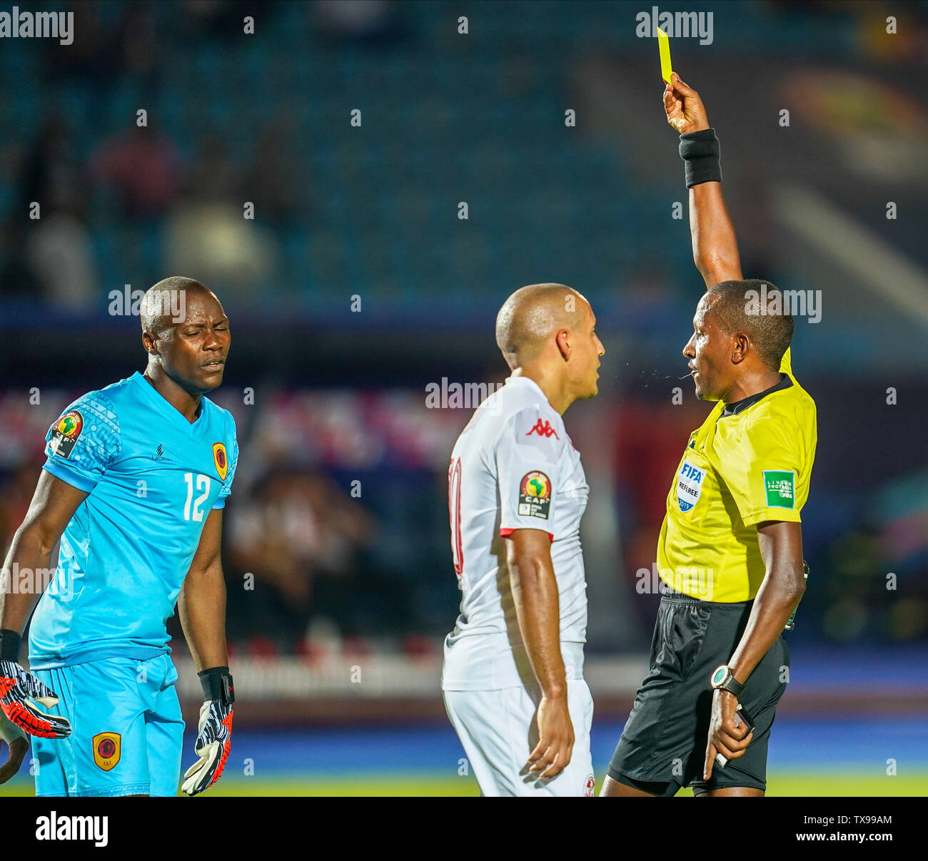 June 24, 2019: !a12! receiving a yellow card during the 2019 African Cup of Nations match between Tunisia and Angola at the Suez Army stadium in Suez, Egypt. Ulrik Pedersen/CSM. Stock Photo