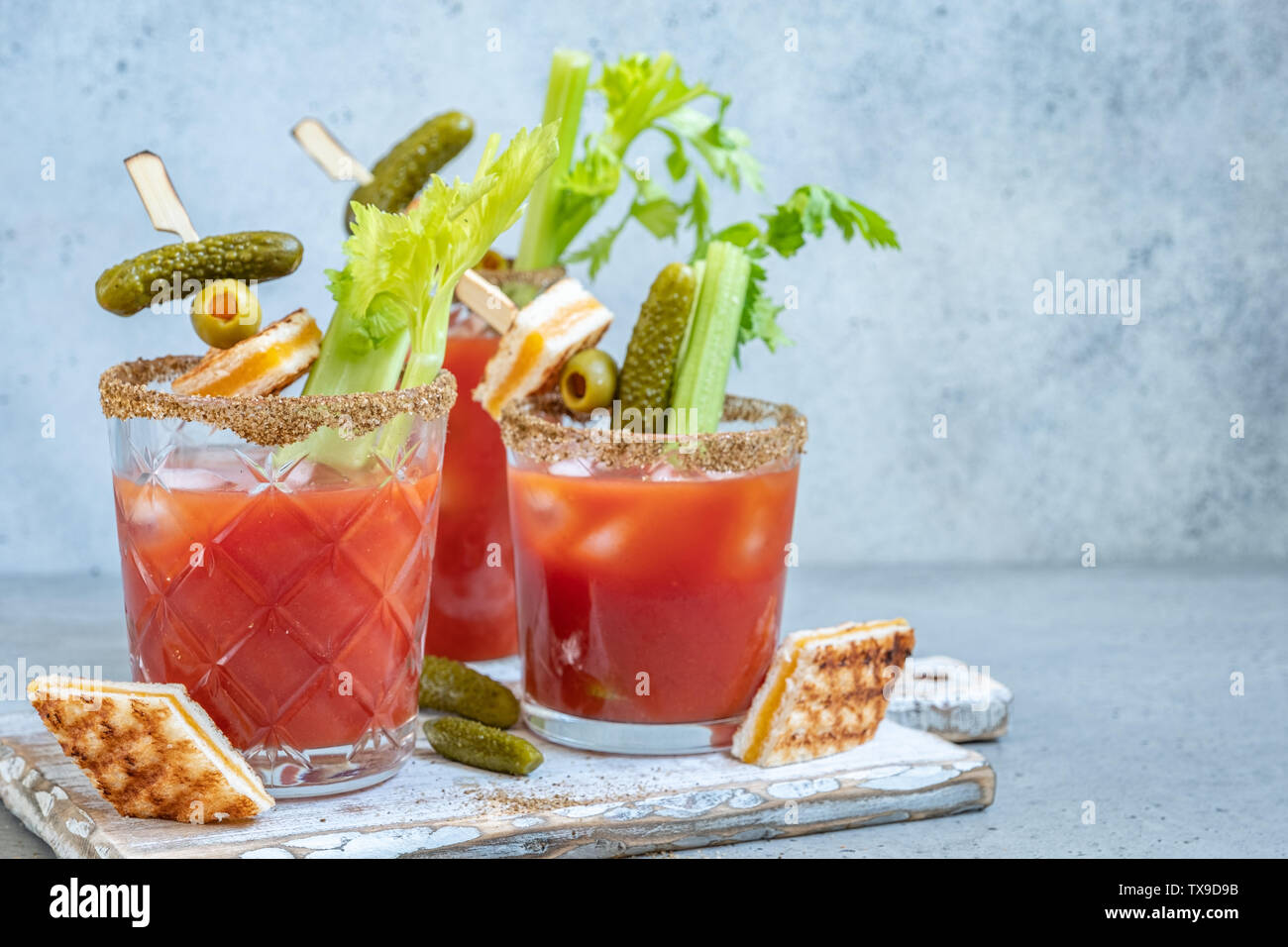 Bloody Mary Cocktail with tomato juice and pickles Stock Photo Alamy