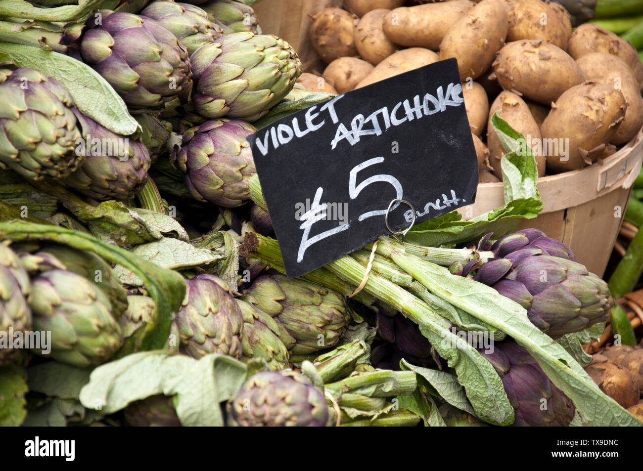 Artichokes for sale on a market stall in Borough Market, London Stock Photo