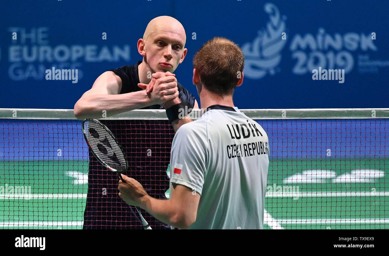 Minsk. Belarus. 24 June 2019. Toby Penty (GBR) and Milan Ludik (CZE) shake hands after they play in the group stages of the Badminton competition at the 2nd European games. Credit: Sport In Pictures/Alamy Live News Stock Photo