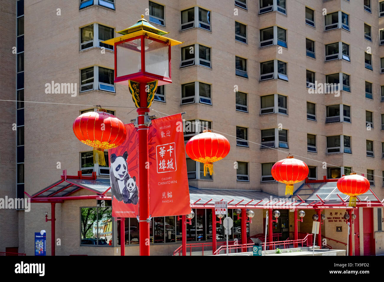 Streetlamp and Chinese lanterns, Chinatown, Calgary, Alberta, Canada Stock Photo