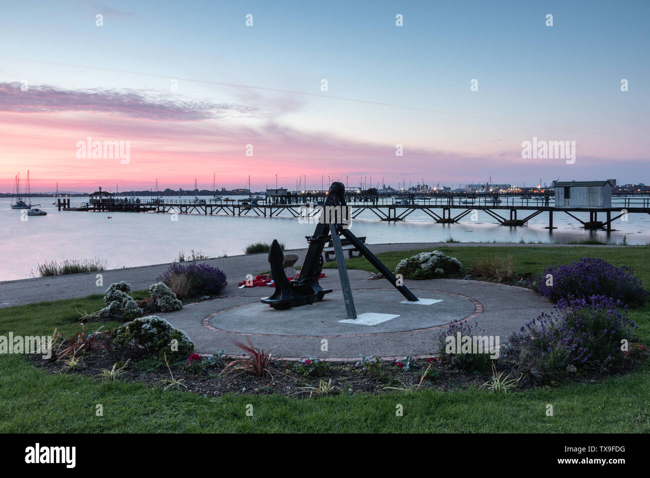 The anchor war memorial at the Hardway slipway in Gosport, Hampshire at sunrise Stock Photo