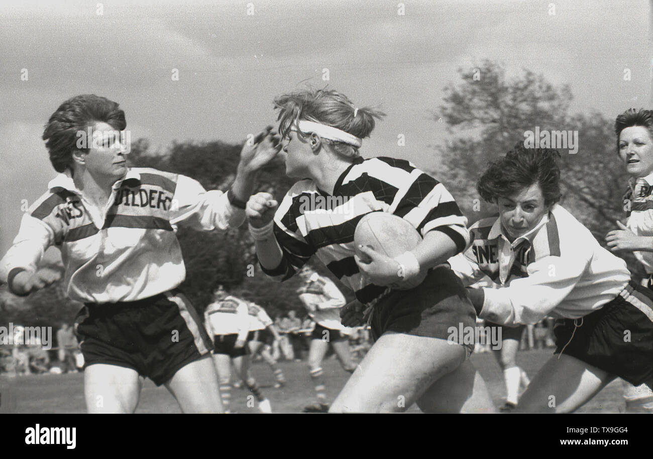 1980s, women playing a game of rugby union, England, UK. In was in this era, that the women's game really developed. In 1982 the first women's international match took place and in 1983 the Women's Rugby Football Union (WRFU) was formed to govern the game in Britain. Stock Photo