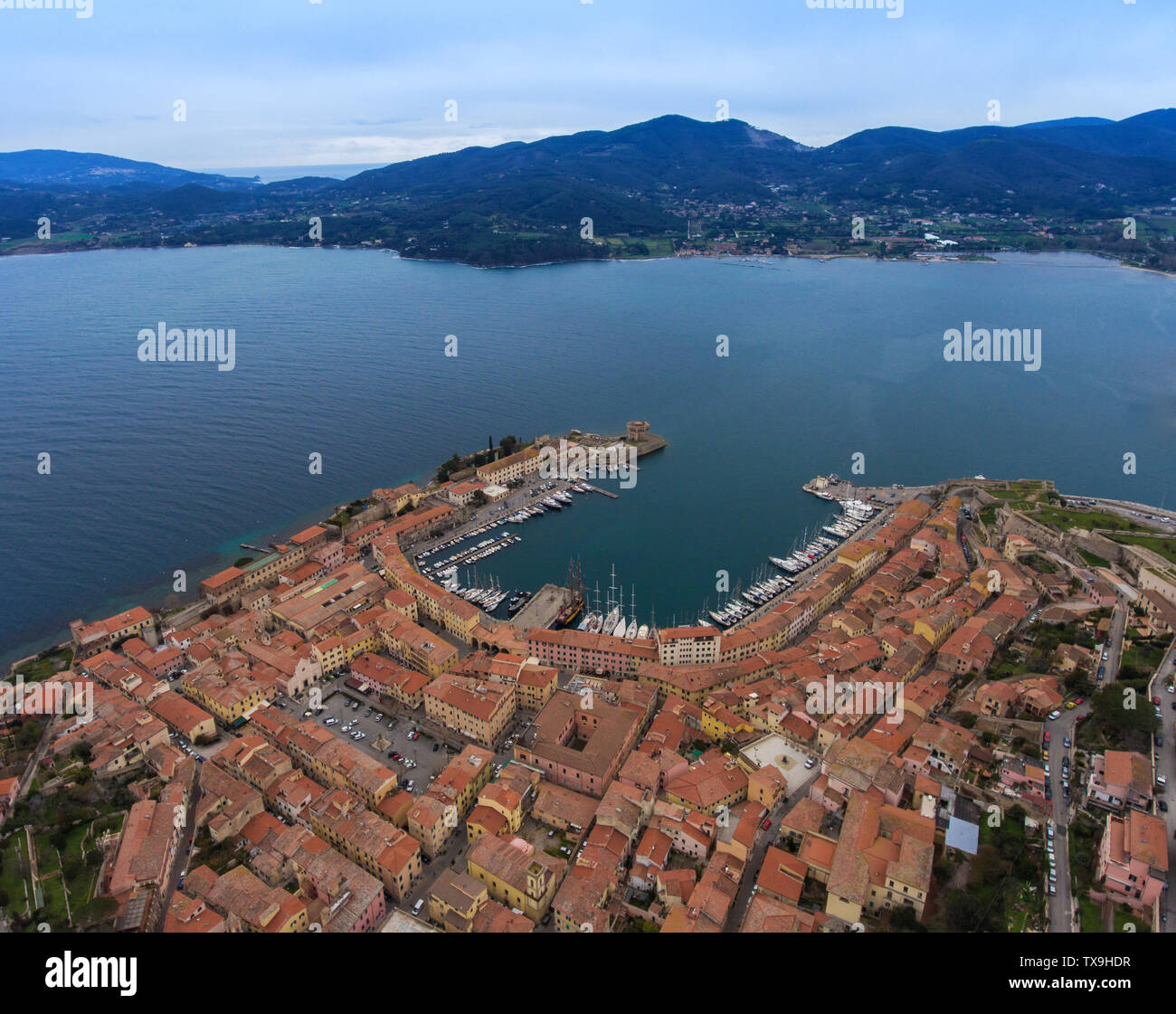 Air view of the port and the city centre of Portoferraio. The ...