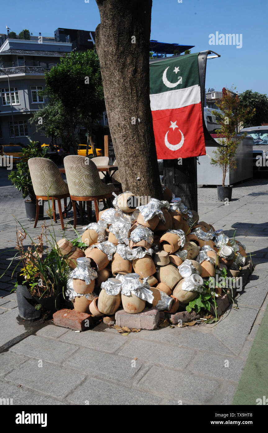 Clay Pots outside of restaurant, used for cooking kebabs, Sultanahnet, Istanbul. Stock Photo