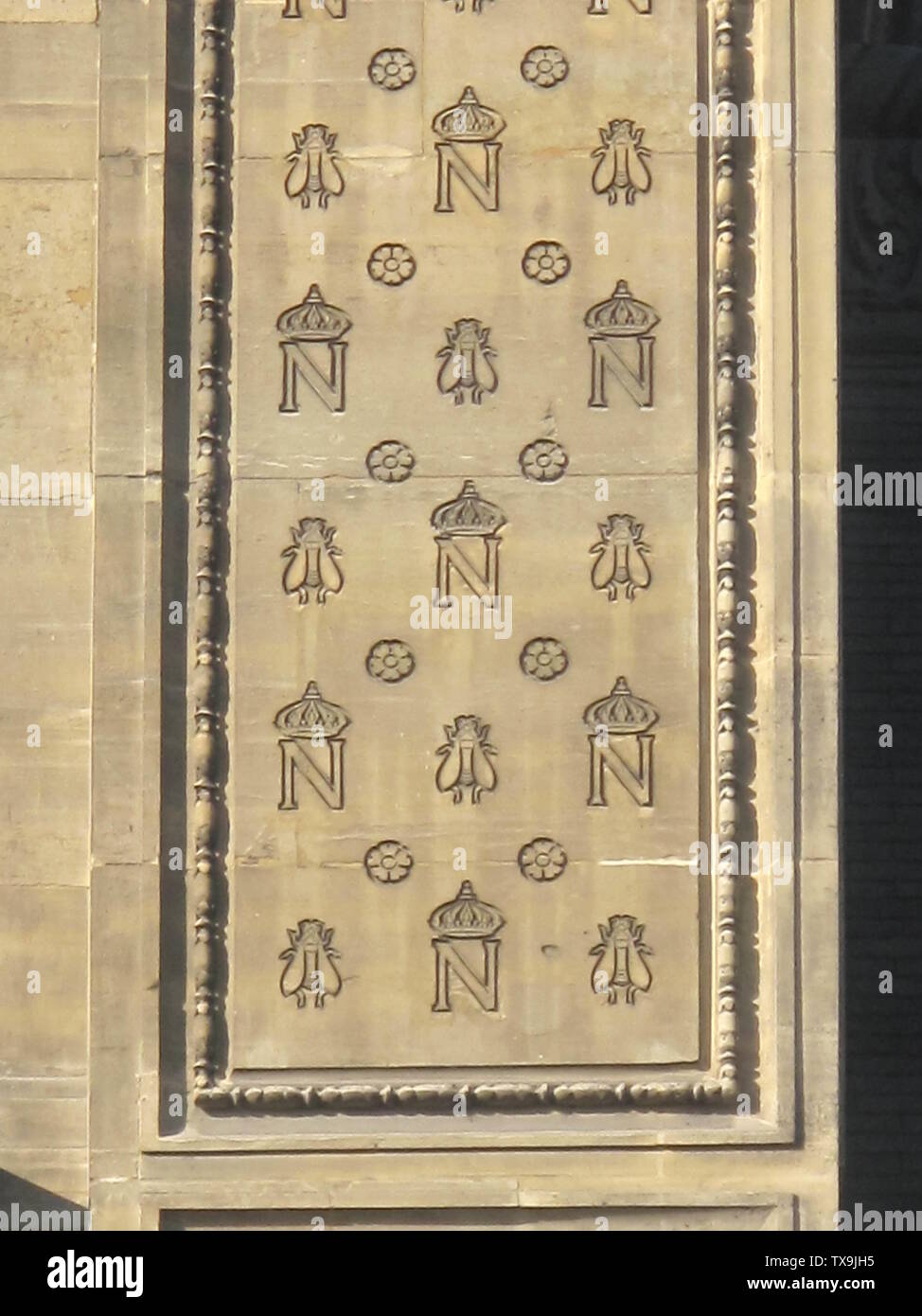 Monogram of Napoleon 1st with bees at the 3rd floor of the pavillon  Richelieu of the Louvre, on the rue de Rivoli, Paris, France. The bee was a  symbol of the French