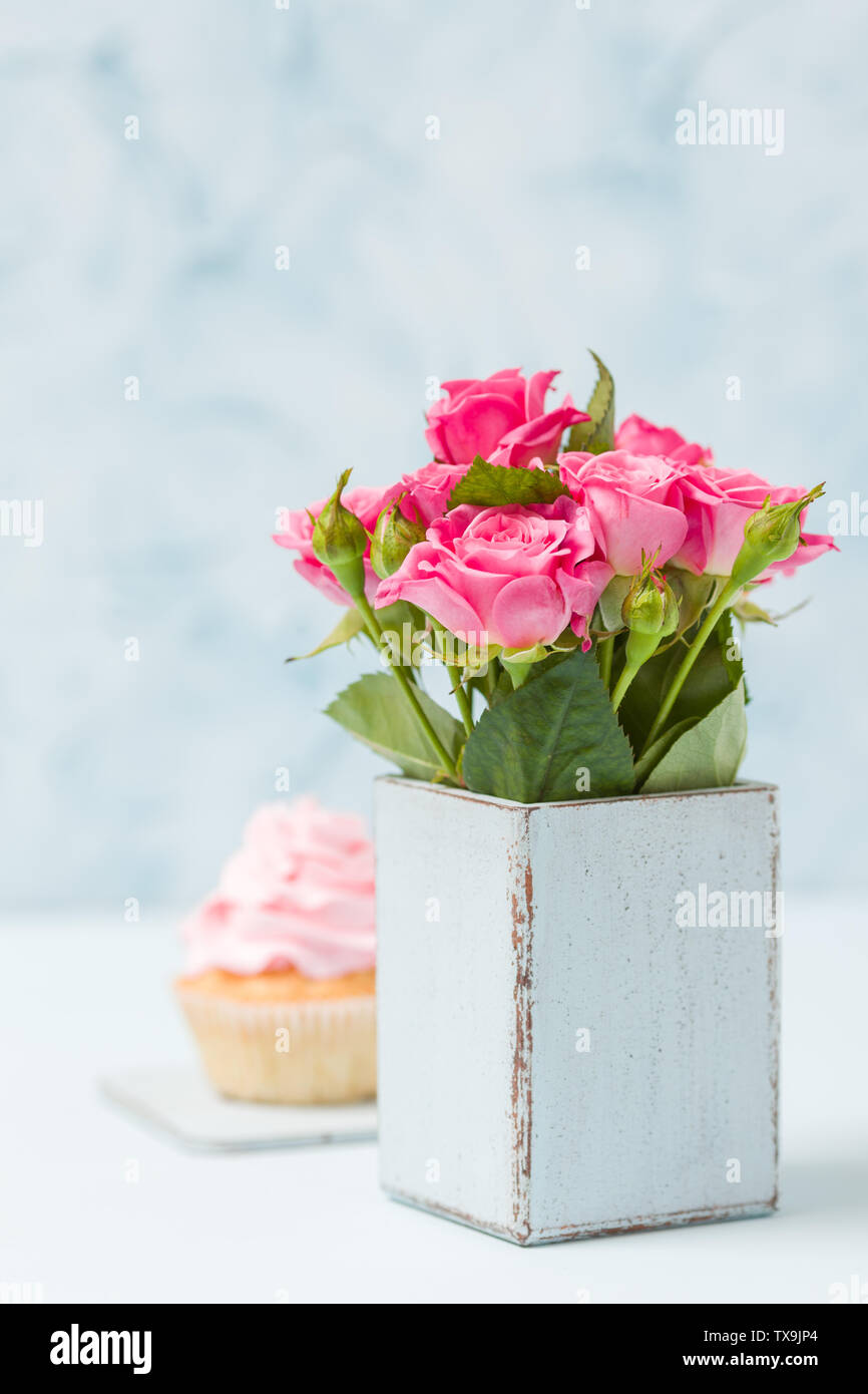 Bouquet Of Roses In Retro Shabby Chic Vase And Cupcake With Pink