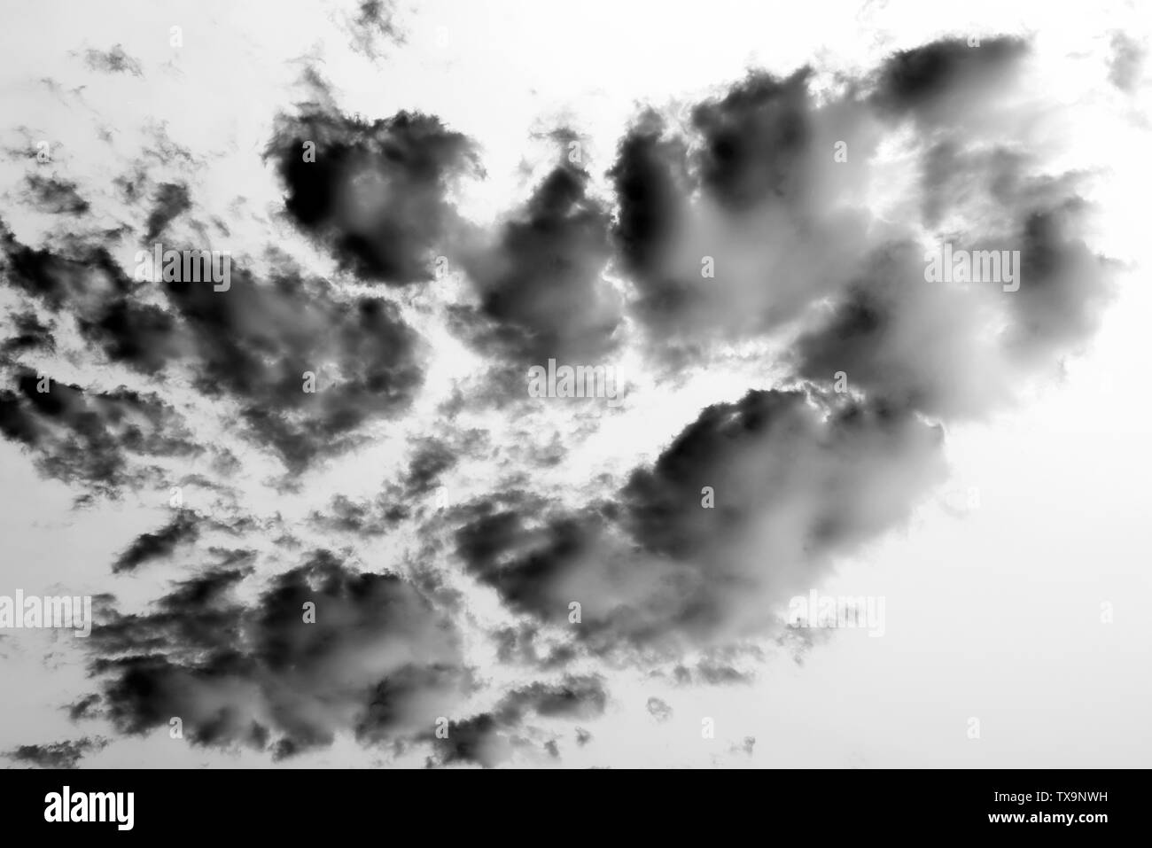 Monochrome Picture of Sky with Clouds as abstract Background or Texture Stock Photo