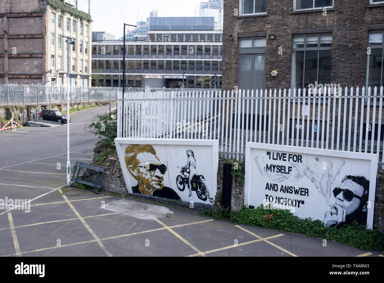 Shoreditch, London, England, UK - April 2019: Big billboards mural in empty car park paying tribute to actor Steve McQueen in Shoreditch East London Stock Photo