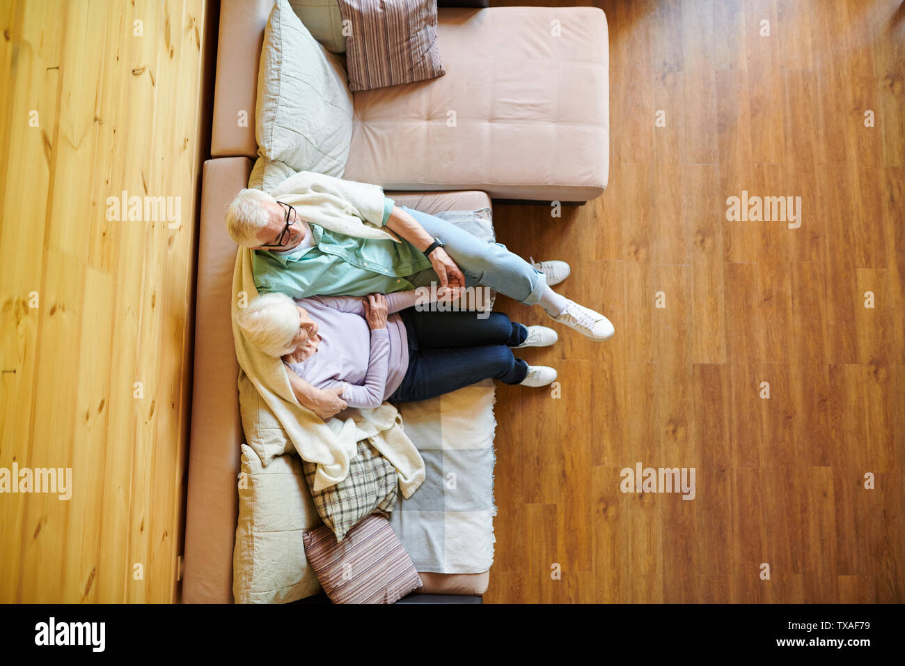 Woman relax couch indoor mature hi-res stock photography and images - Alamy