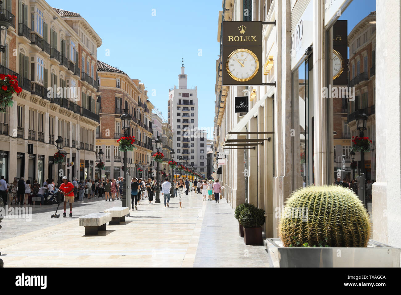 The expensive designer shopping and pedestrian street of Calle Marques de  Larios, in the centre of Malaga city, Spain, Europe Stock Photo - Alamy