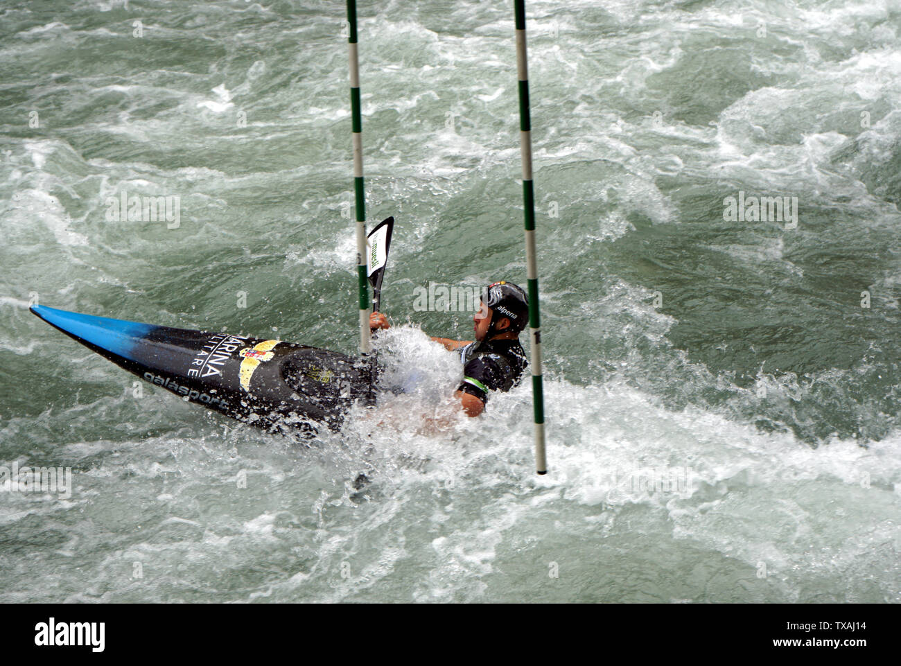 Single canoeist on the Passer River, Merano, Italy in 2019 ICF race Stock Photo