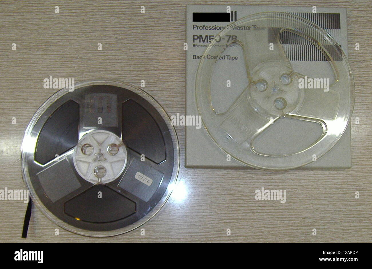Magnetic audio tape & reel. size  7 inch (diameter); 26 January 2006Â (according to Exif data); Own work; Toki-ho; Stock Photo