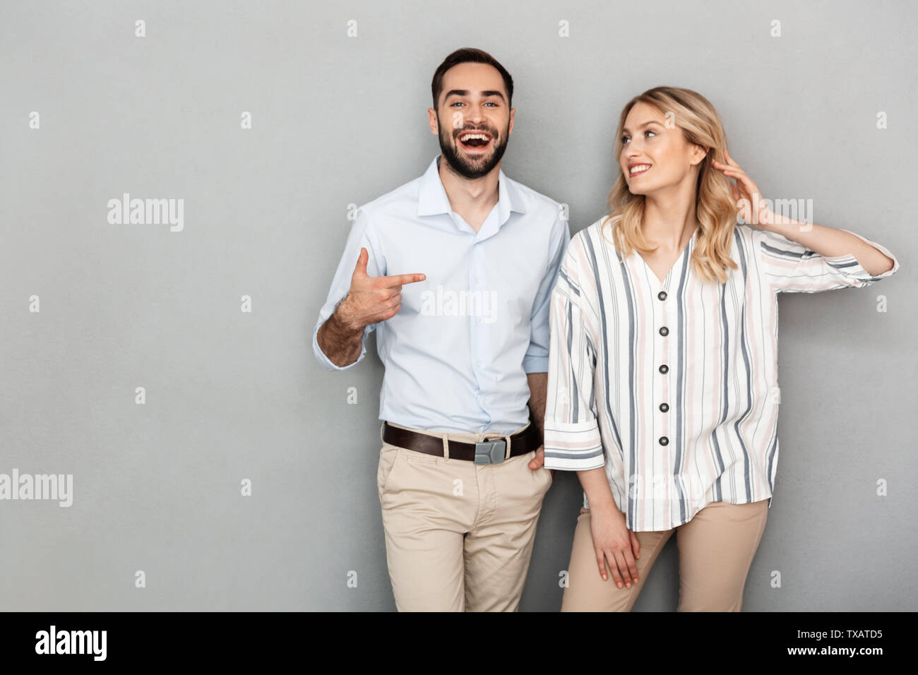 Man pointing finger at woman hi-res stock photography and images - Alamy