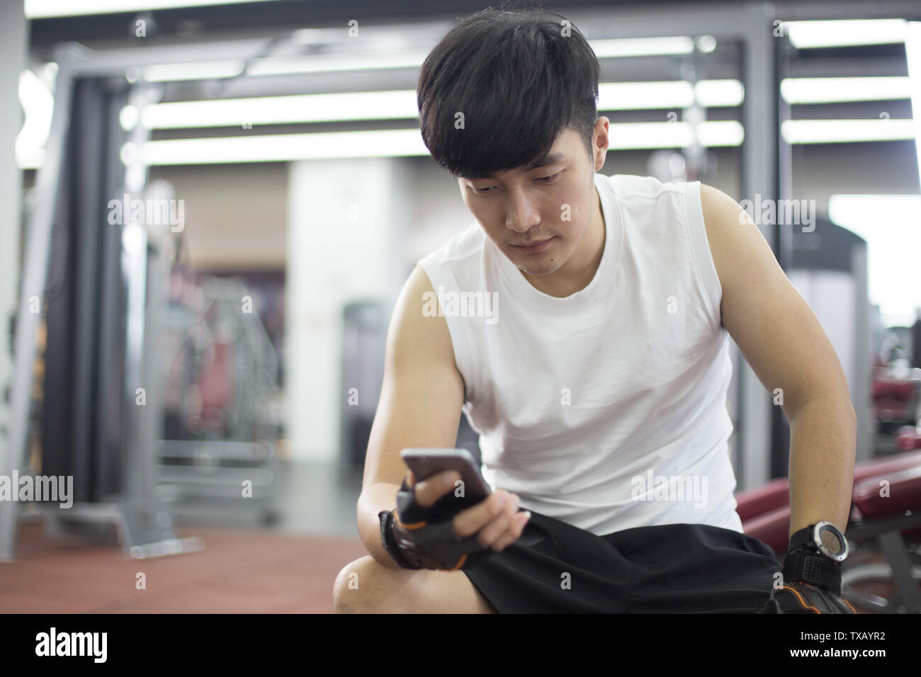 Young Chinese Man Using Exercise Stock Photos Young Chinese Man Images, Photos, Reviews